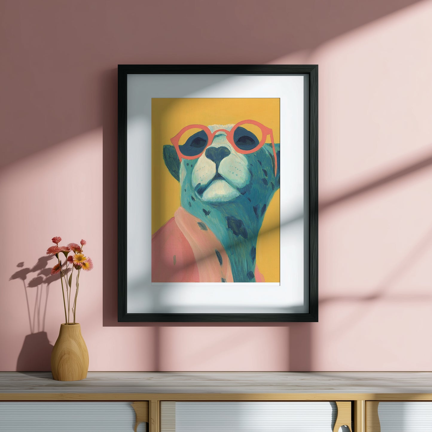 Framed artwork of a colorful big cat with glasses