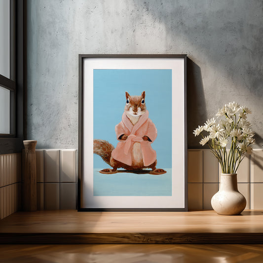 Framed artwork of a squirrel in a pink robe, based on The Big Lebowski film 