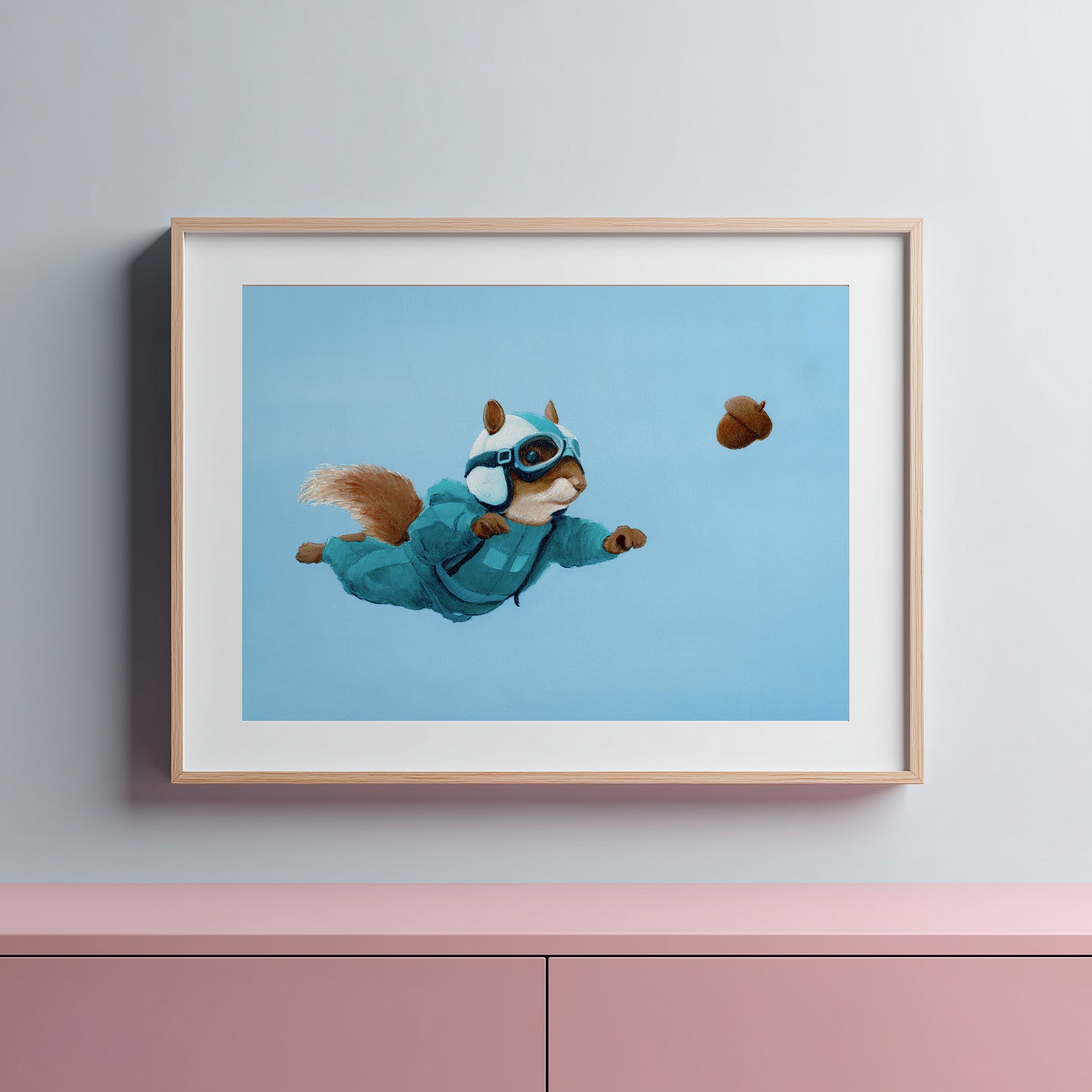 Squirrel in a blue jacket and goggles against a light blue background.