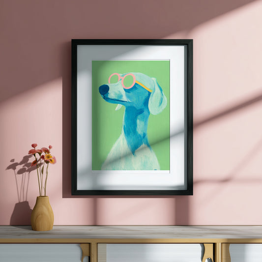 Framed artwork of a blue dog with pink sunglasses on a pink wall.