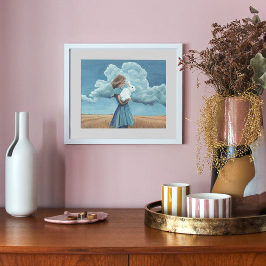 woman standing in a field holding a white rabbit, alice in wonderland, the wizard of oz